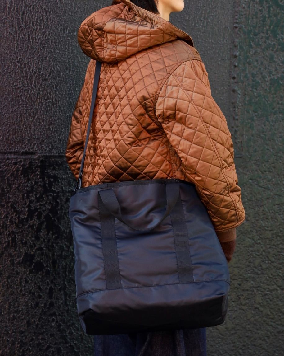 COMME des GARCONS HOMME W-NAME REVERSIBLE BAG x リバーシブルキルティングフーデッドパーカ