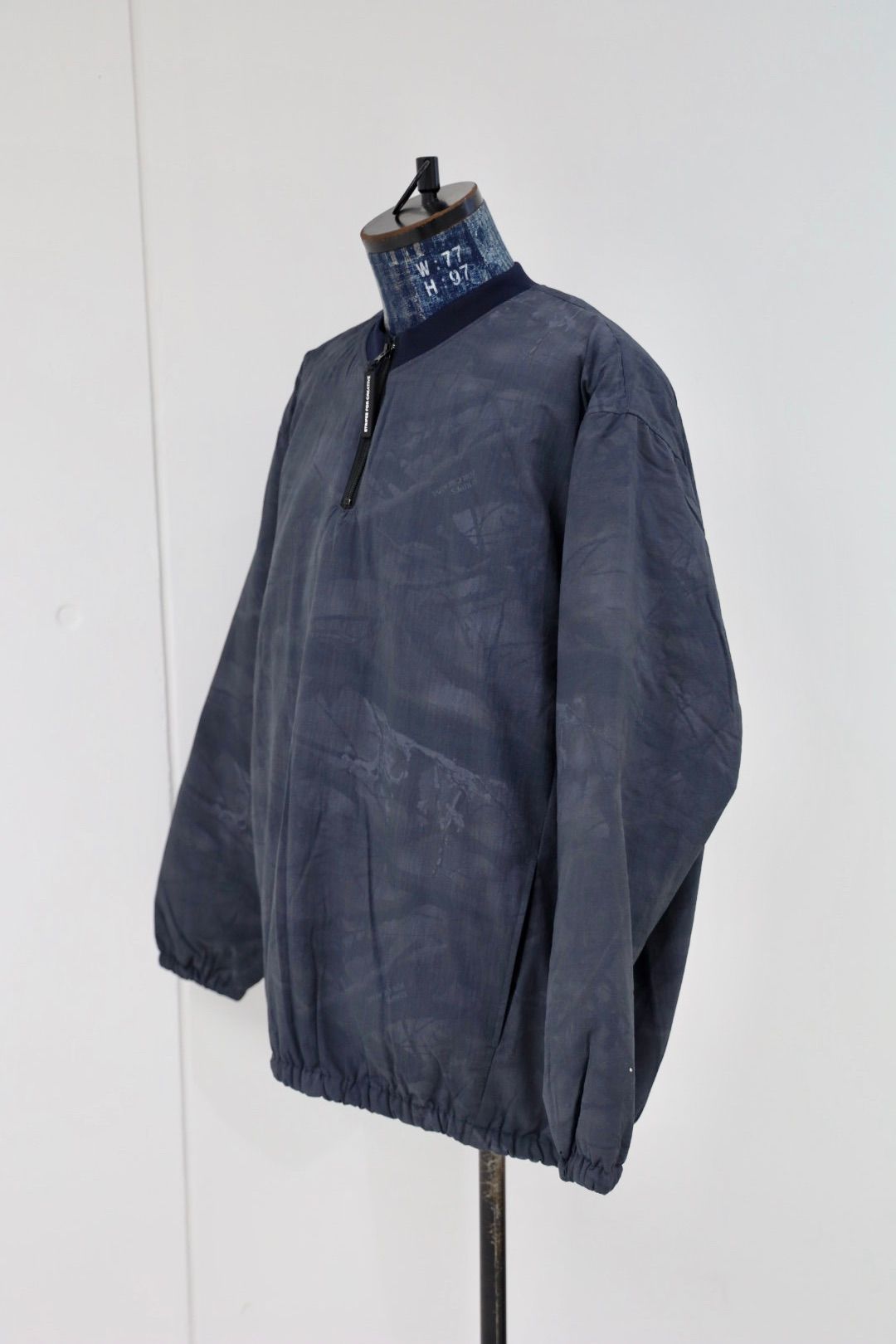 S.F.C 25FW エスエフシー BASEBALL HALF ZIP JACKET (SFCFW25J03)Black Tree Camo