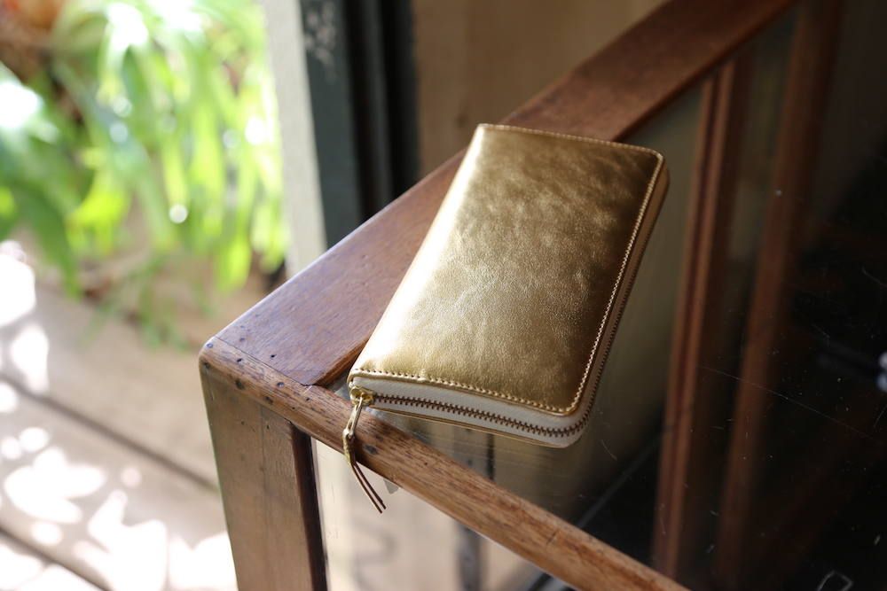 Wallet COMME des GARCONS 「二つ折りラウンドジップ長財布SA0110G」