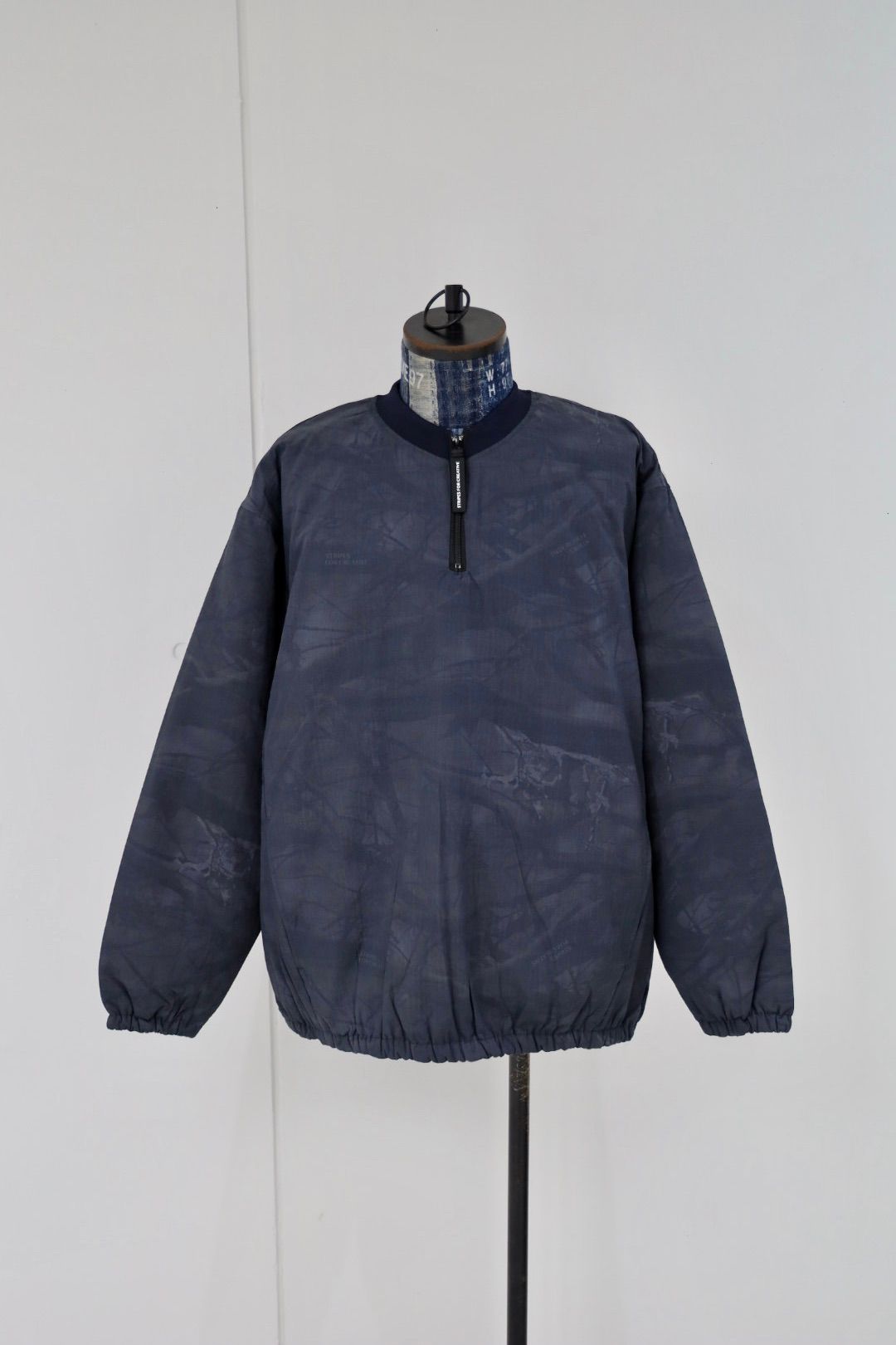 S.F.C 25FW エスエフシー BASEBALL HALF ZIP JACKET (SFCFW25J03)Black Tree Camo