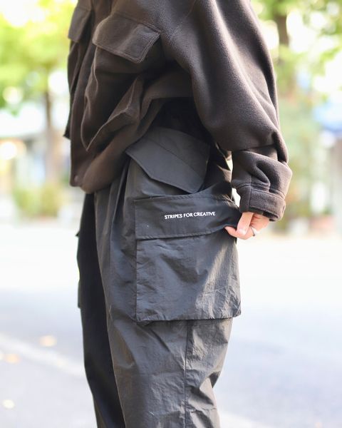 STRIPES FOR CREATIVE FW23 SUPER WIDE CARGO PANTSスタイル