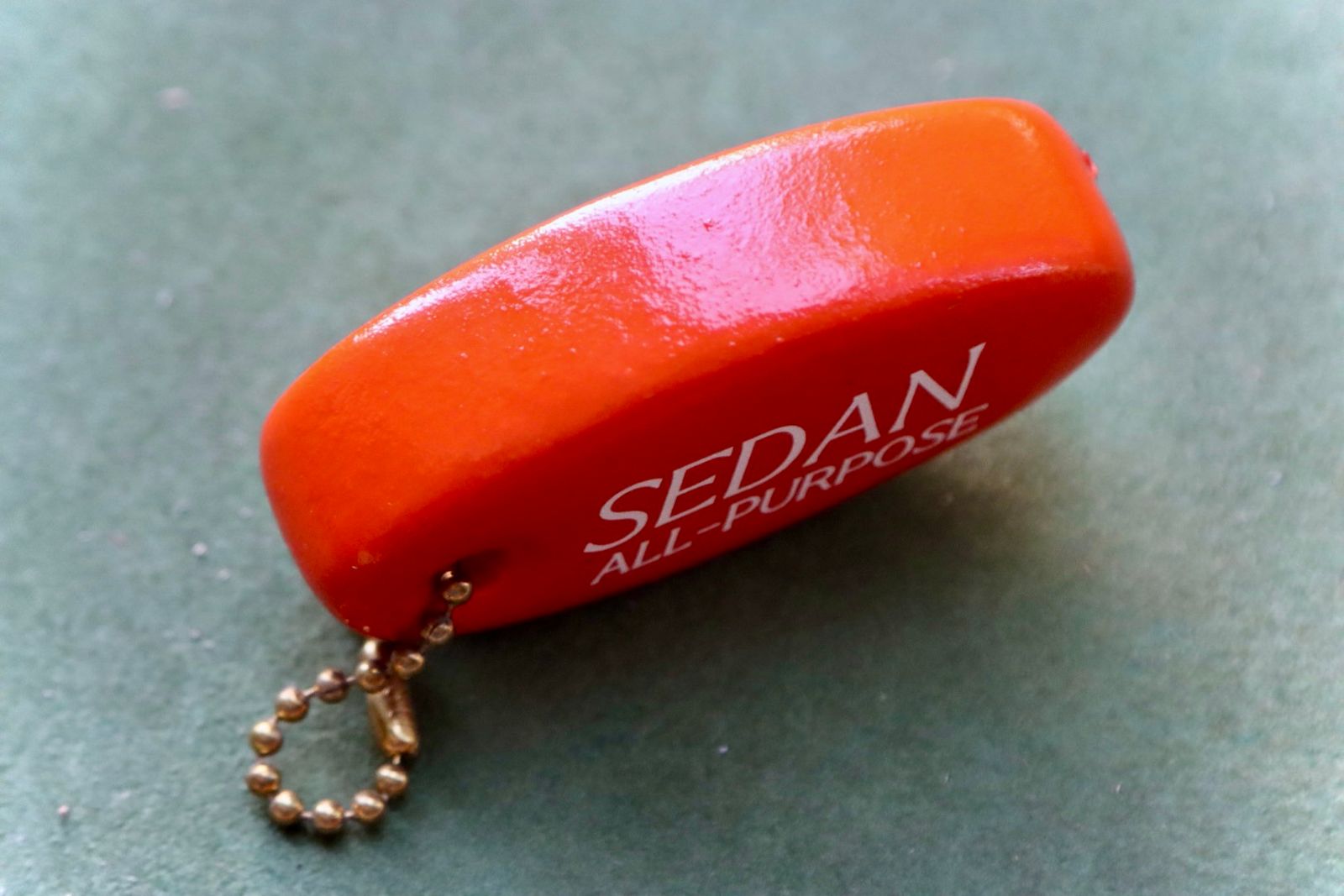 セダンオールパーパス23FW Oval Logo Key Float(SD23F-AC01)Orange