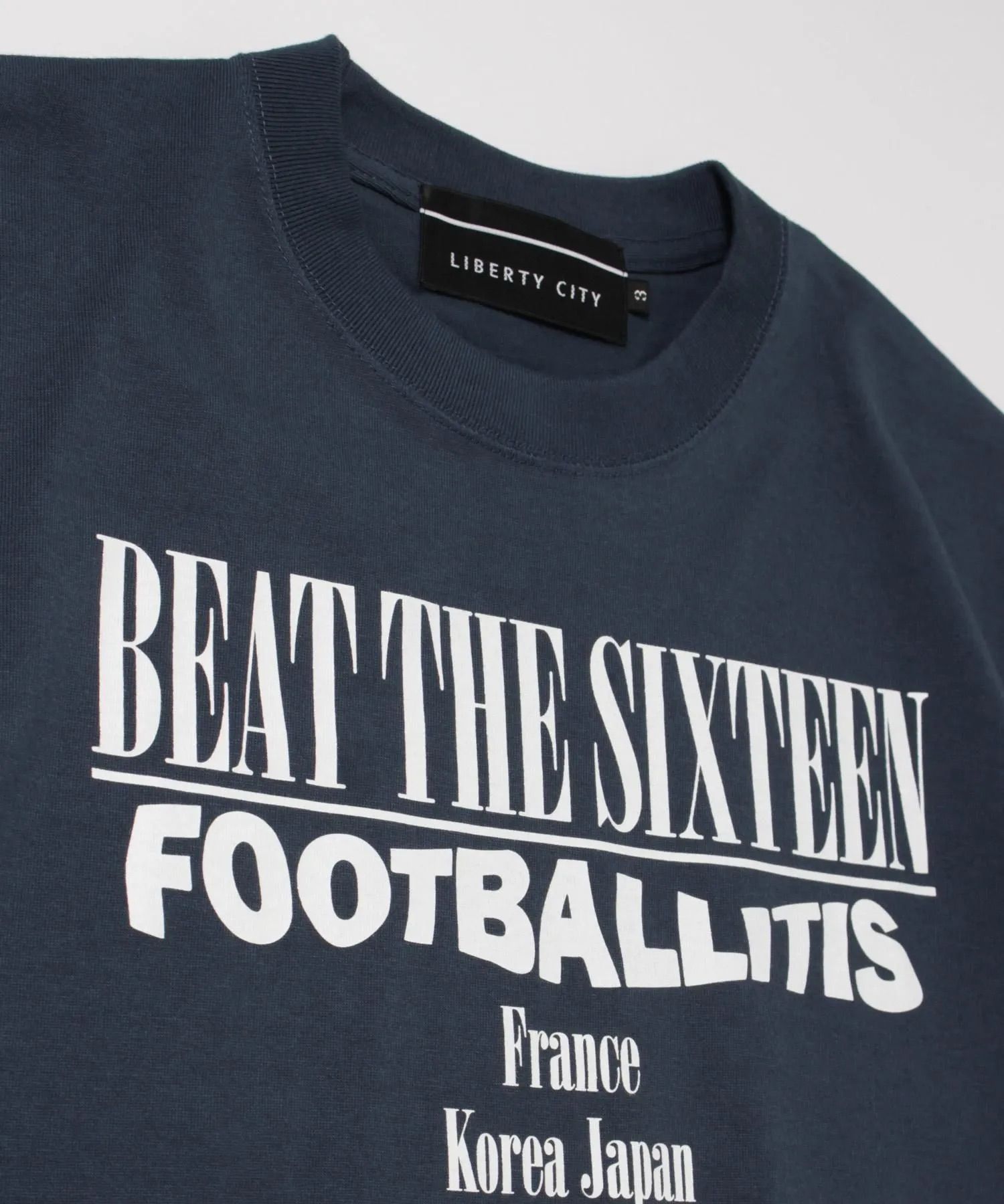【FOOTBALLITIS】[SMILEY] Tシャツ / BLUE [261321NV]