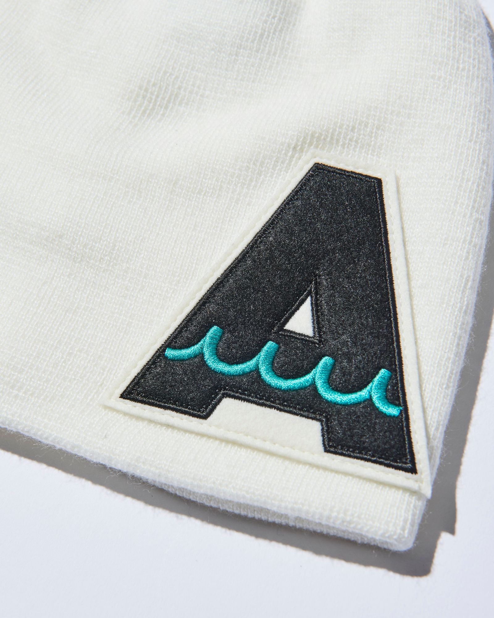 ACANTHUS - ACANTHUS x mutaMARINE / muta A Logo Back Pool Knit Cap