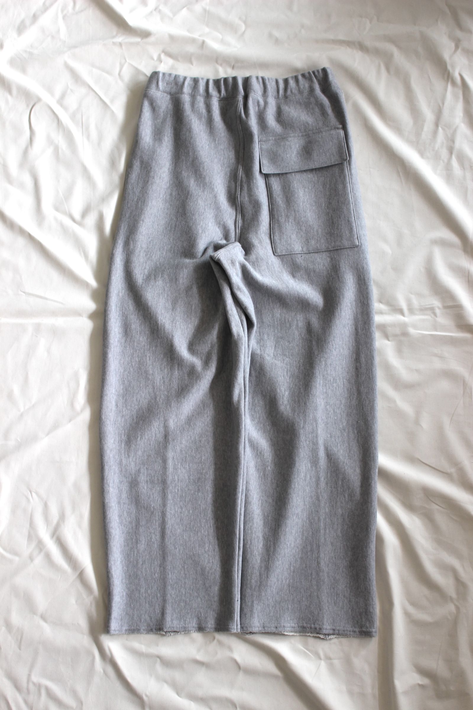 HAKEEM TWIST TROUSERS | HEATHER GRAY | スウェットパンツ