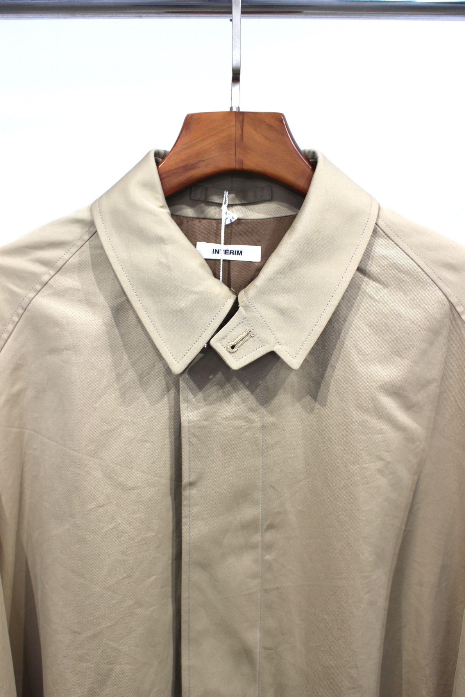 インテリム INTERIM SINGLE RAGLAN COAT INTÉRIM / インテリム】HYPER BIG PURE BLACK WOOL GABERDINE