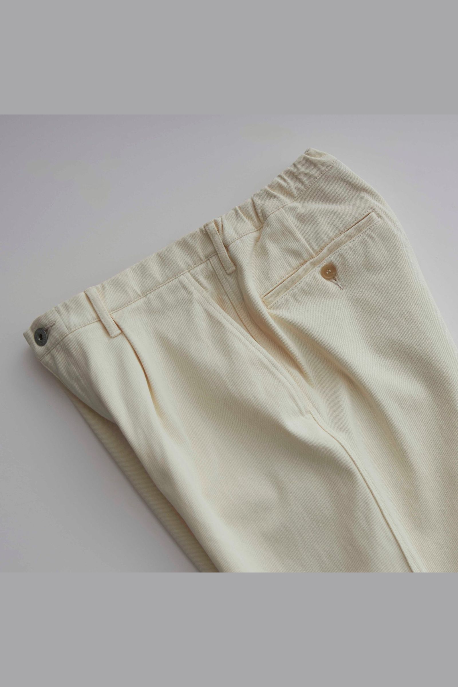 DENIM 1TUCK EZ TAPERED SLACKS -ECRU- | ECRU | ニットデニム