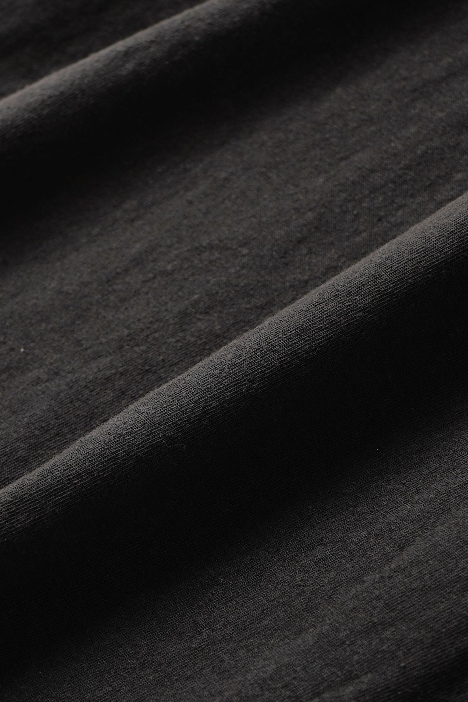 LOOSE FIT PRINT TEE : WE ARE ALL ALONE | BLACK | カットソー