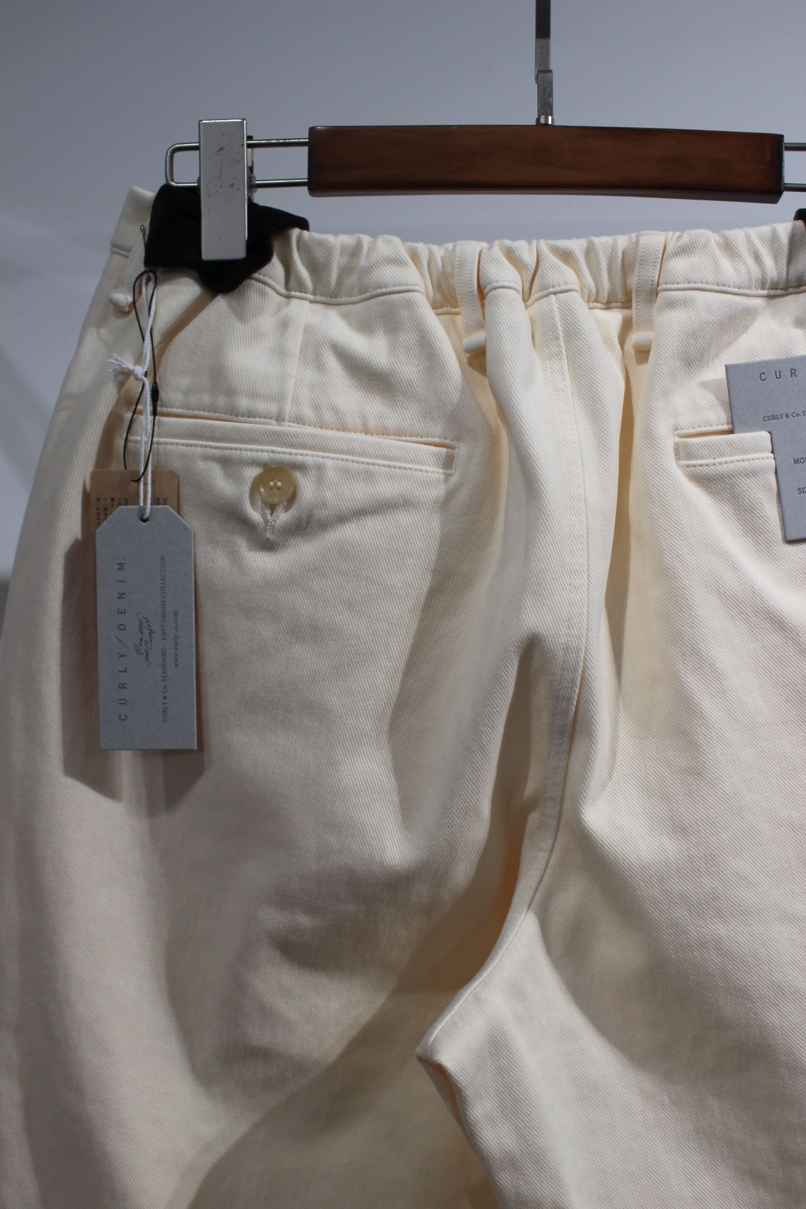 DENIM 1TUCK EZ TAPERED SLACKS -ECRU- | ECRU | ニットデニム