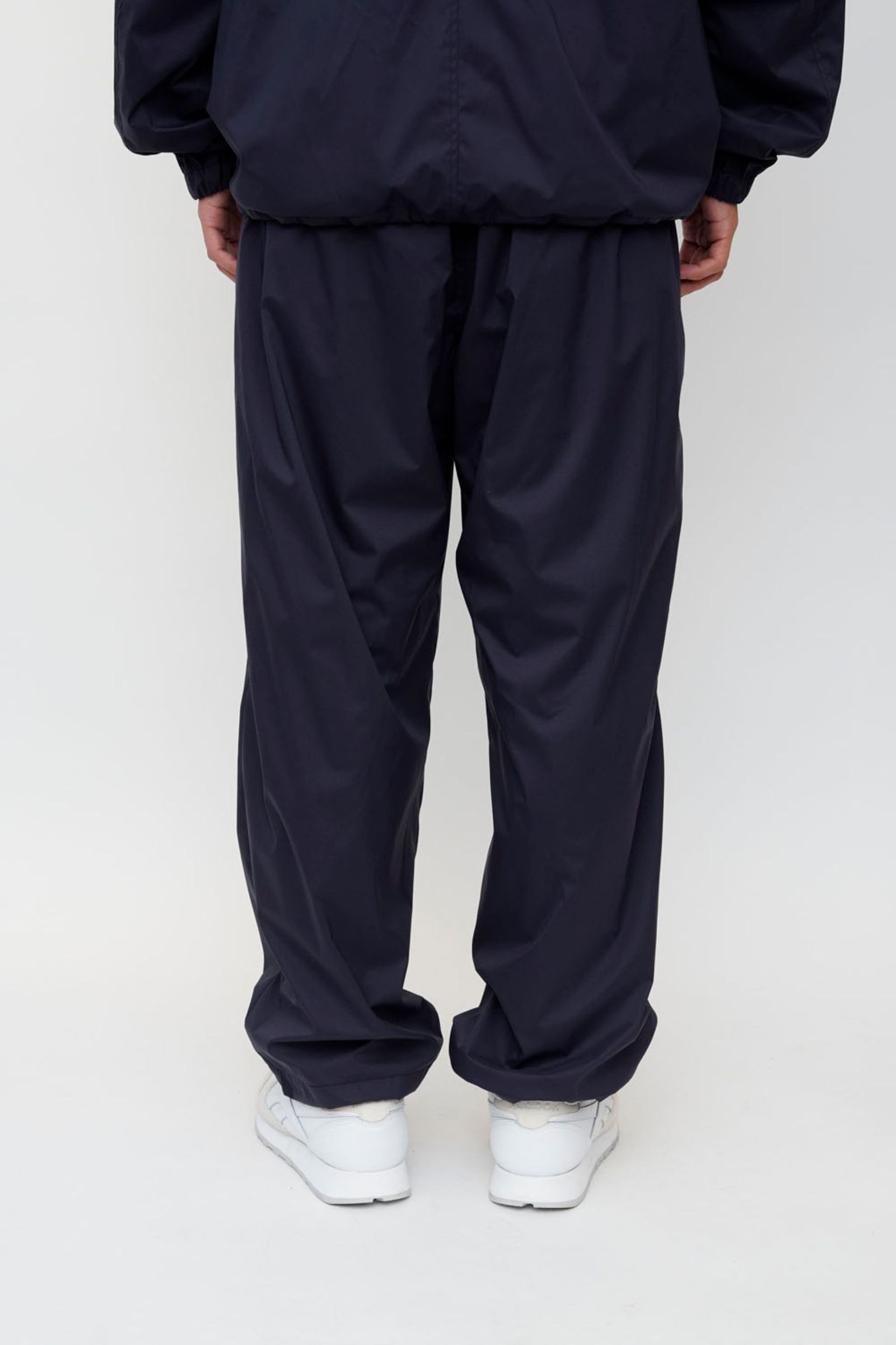 UNIVERSAL PRODUCTSユニバーサルプロダクツTrack Pants UNIVERSAL PRODUCTS - NYLON TRACK PANTS / BLACK | Stripe