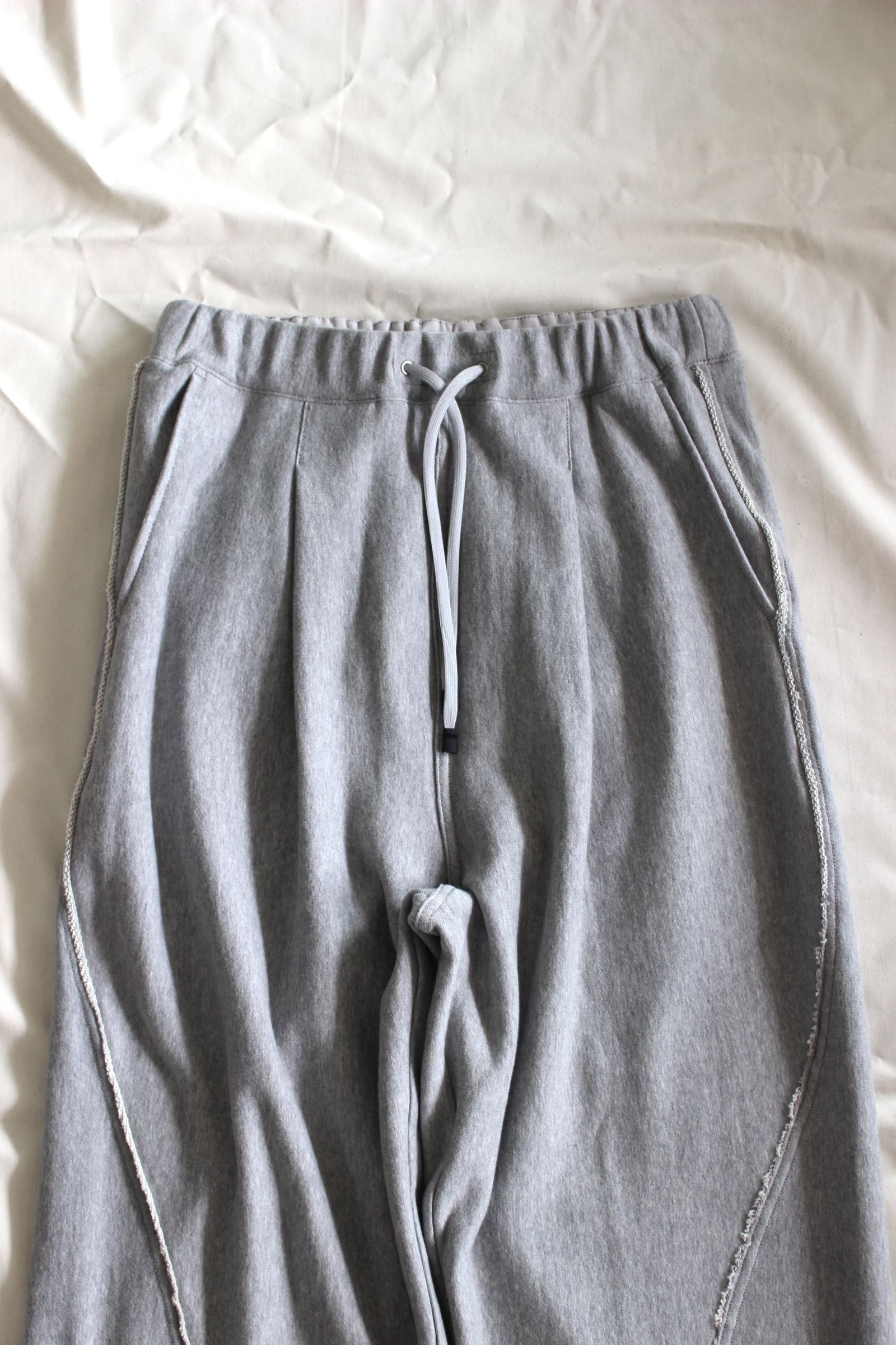 HAKEEM TWIST TROUSERS | HEATHER GRAY | スウェットパンツ