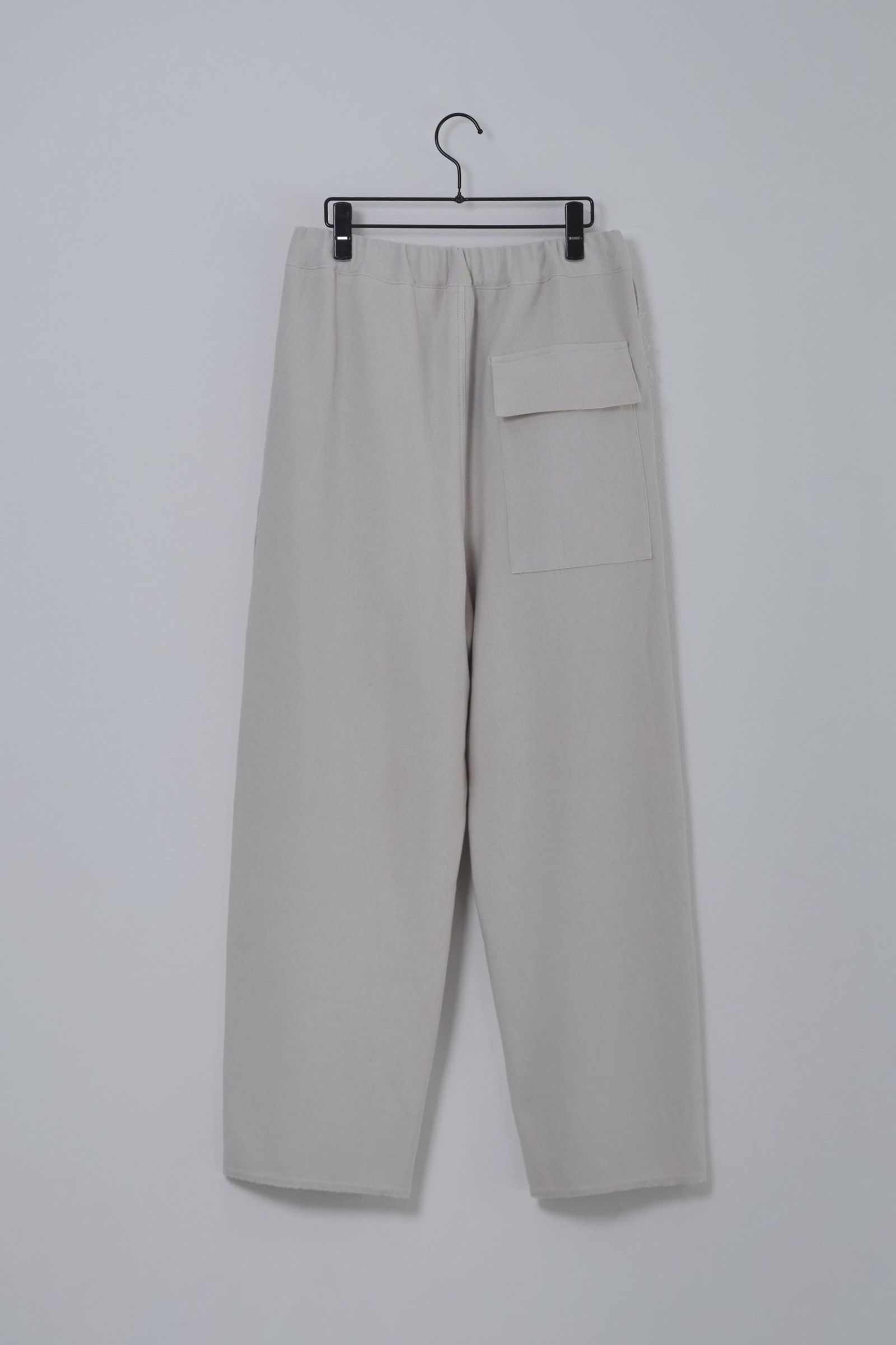 HAKEEM TWIST TROUSERS | IVORY | スウェットパンツ