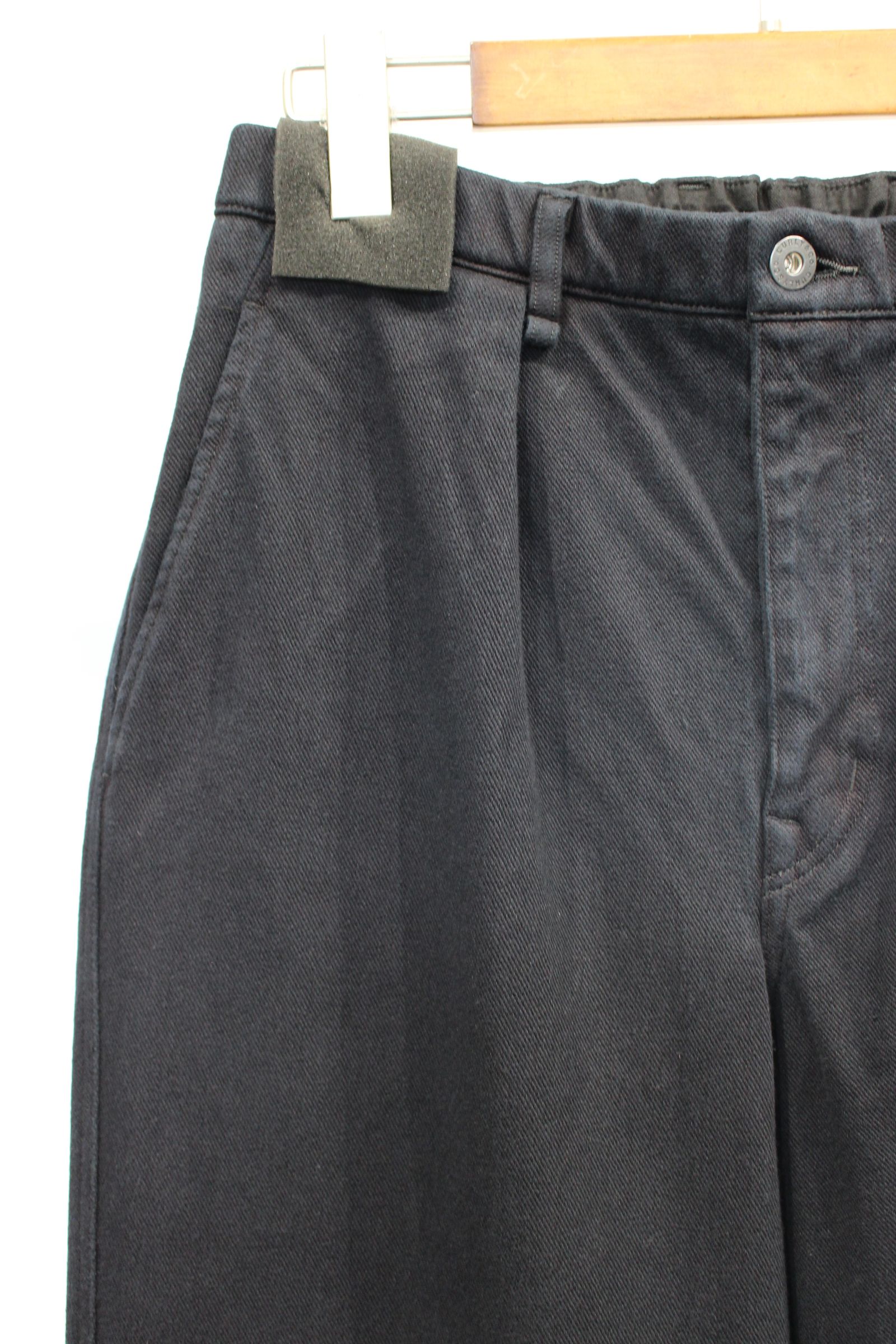 DENIM 1TUCK EZ TAPERED SLACKS -overdyed- | BLACK | ニットデニム
