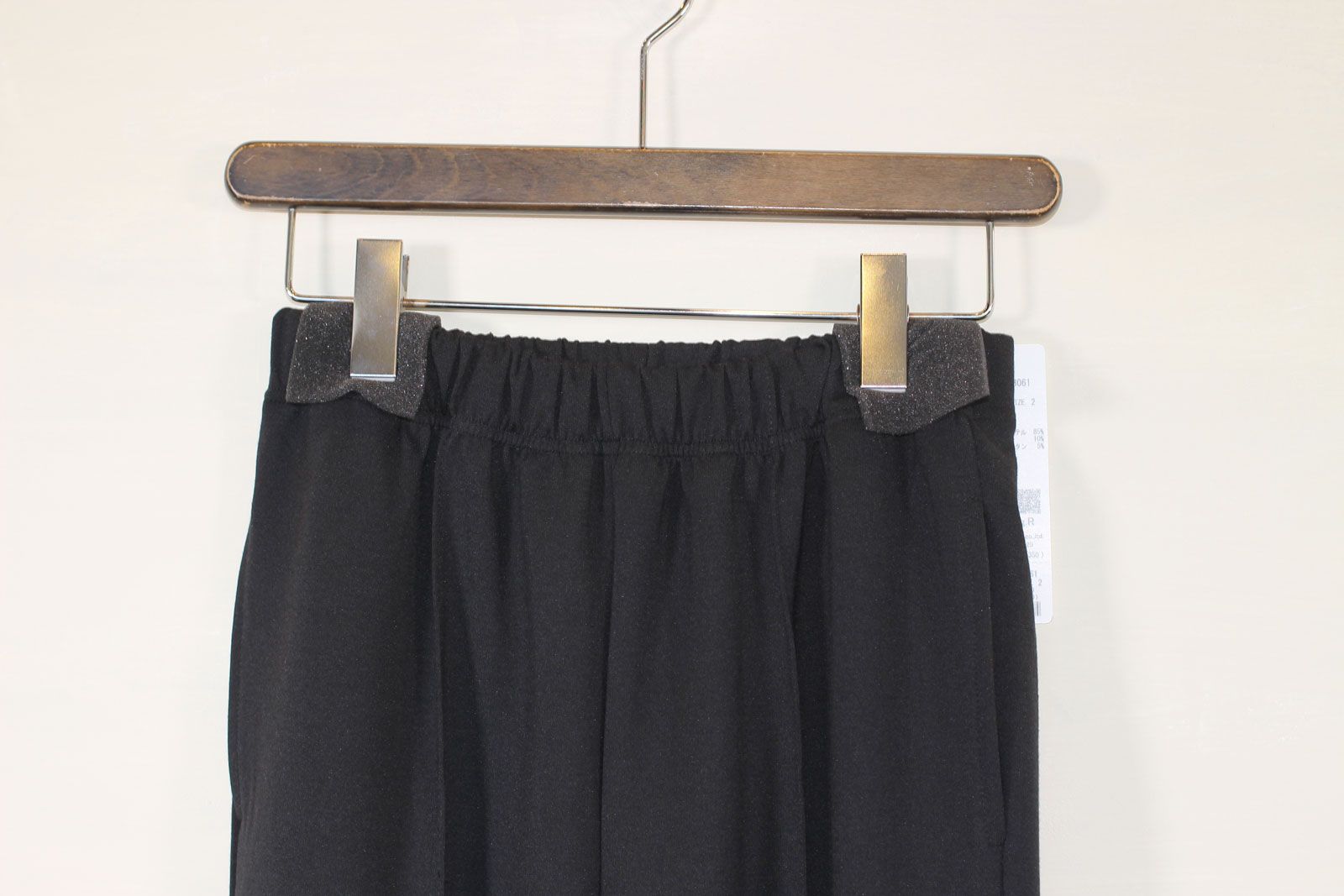 裾スリットセンタープレスフレアパンツ ブラック