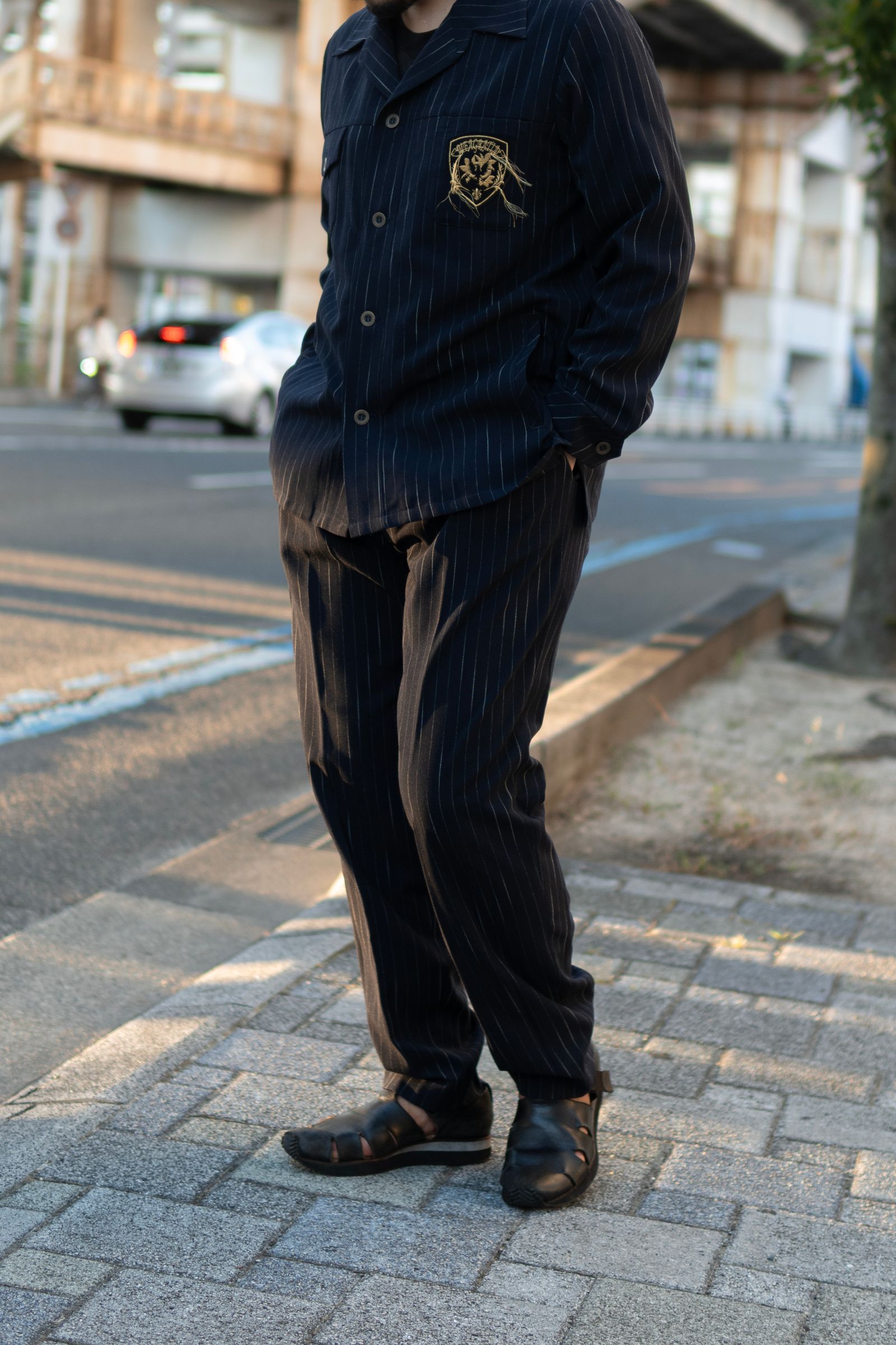 Worsted striped 4 tuck trousers / nvy