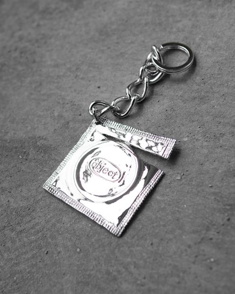 Ripped Raincoat Keyring / Silver