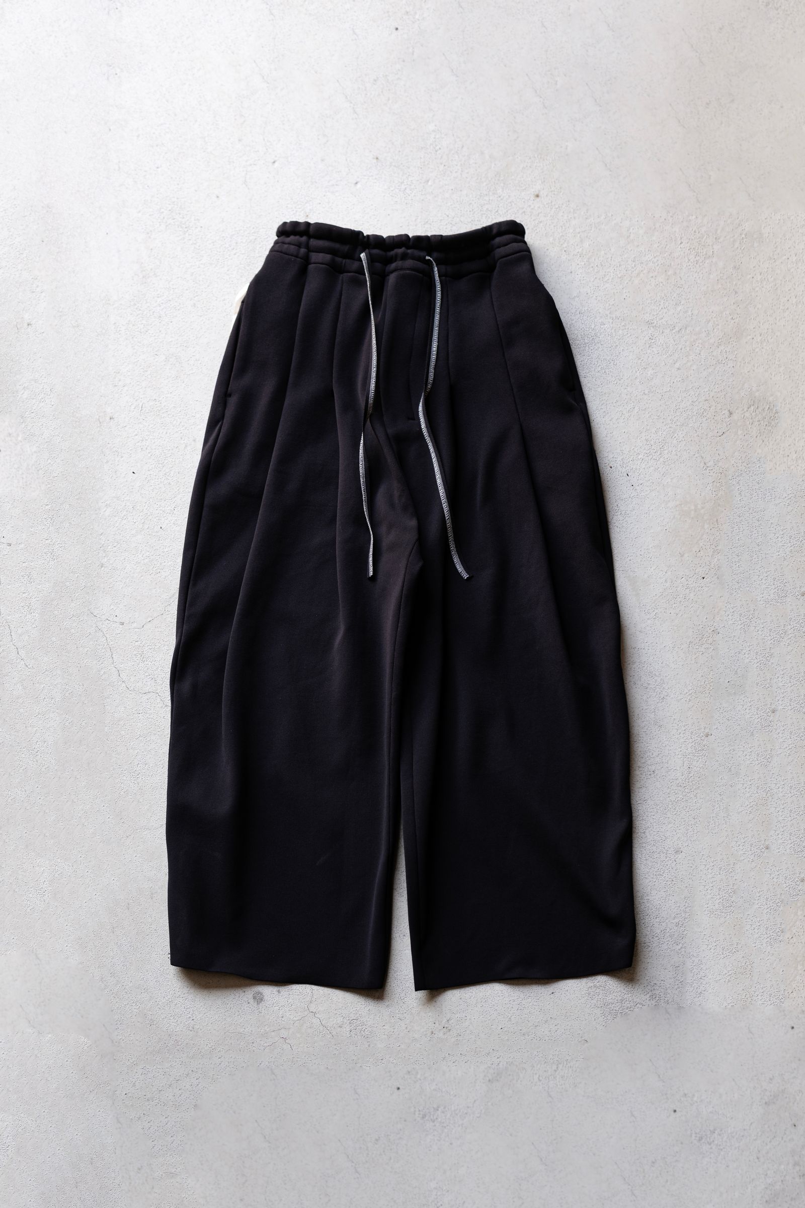 SHINYAKOZUKA - KNITTED BAGGY / COLOURLESS BLACK | Retikle SHINYAKOZUKA - KNITTED BAGGY / COLOURLESS BLACK | Retikle