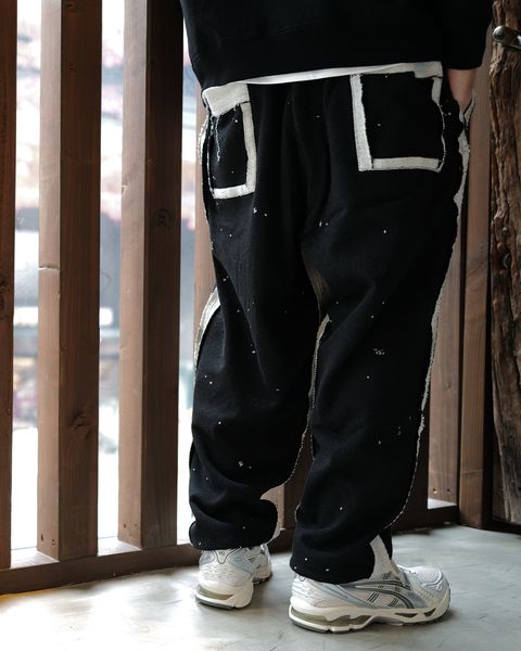 MASTERMIND WORLD : CUT-OFF SWEATPANTS