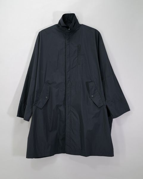OVERSIZE RAIN COAT .