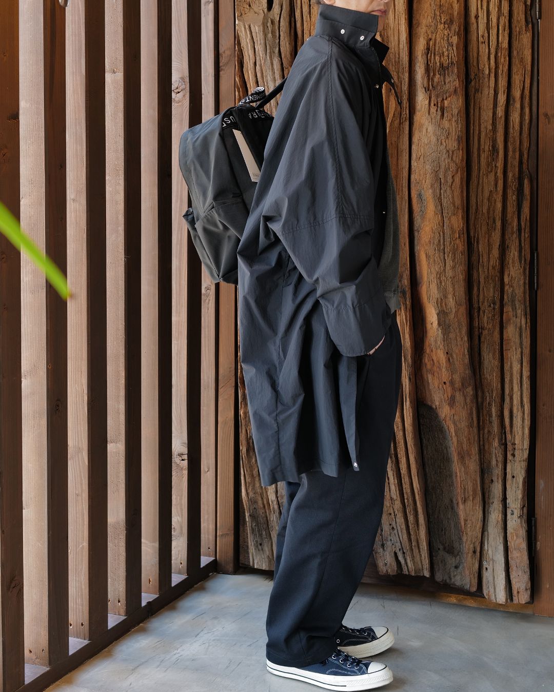 OVERSIZE RAIN COAT .