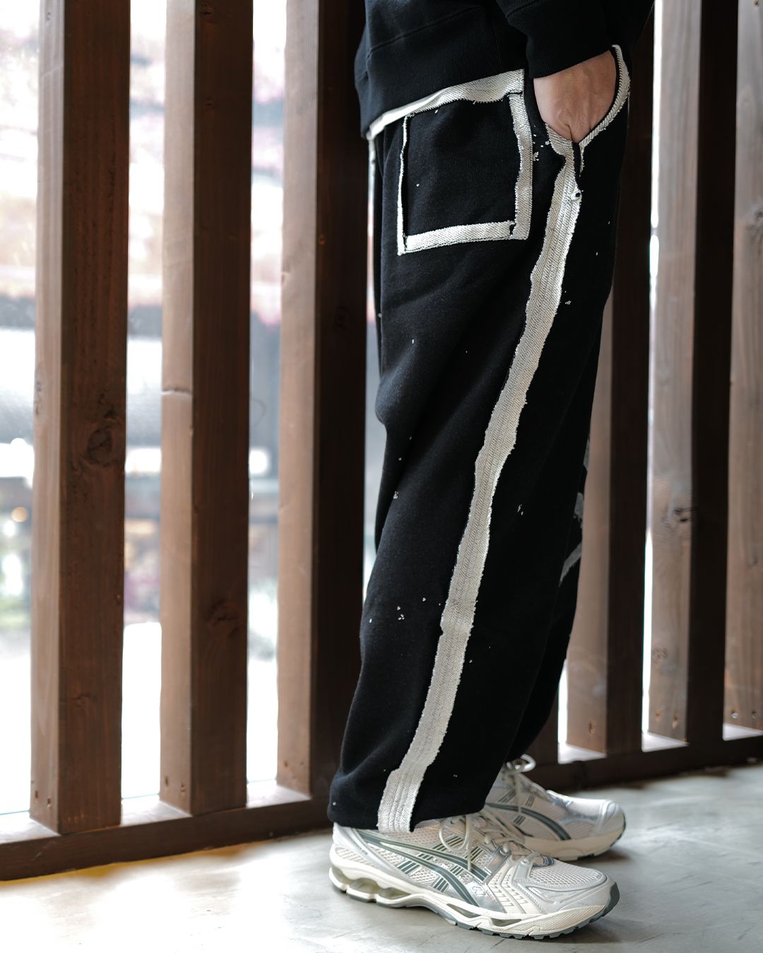 MASTERMIND WORLD : CUT-OFF SWEATPANTS