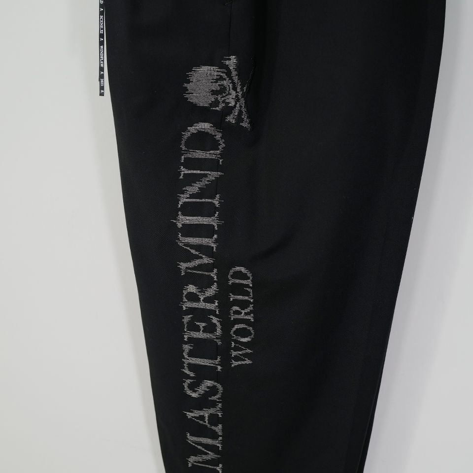 【MASTERMIND WORLD】 EMBROIDERED 2 TUCK EASY PANTS  BLACK