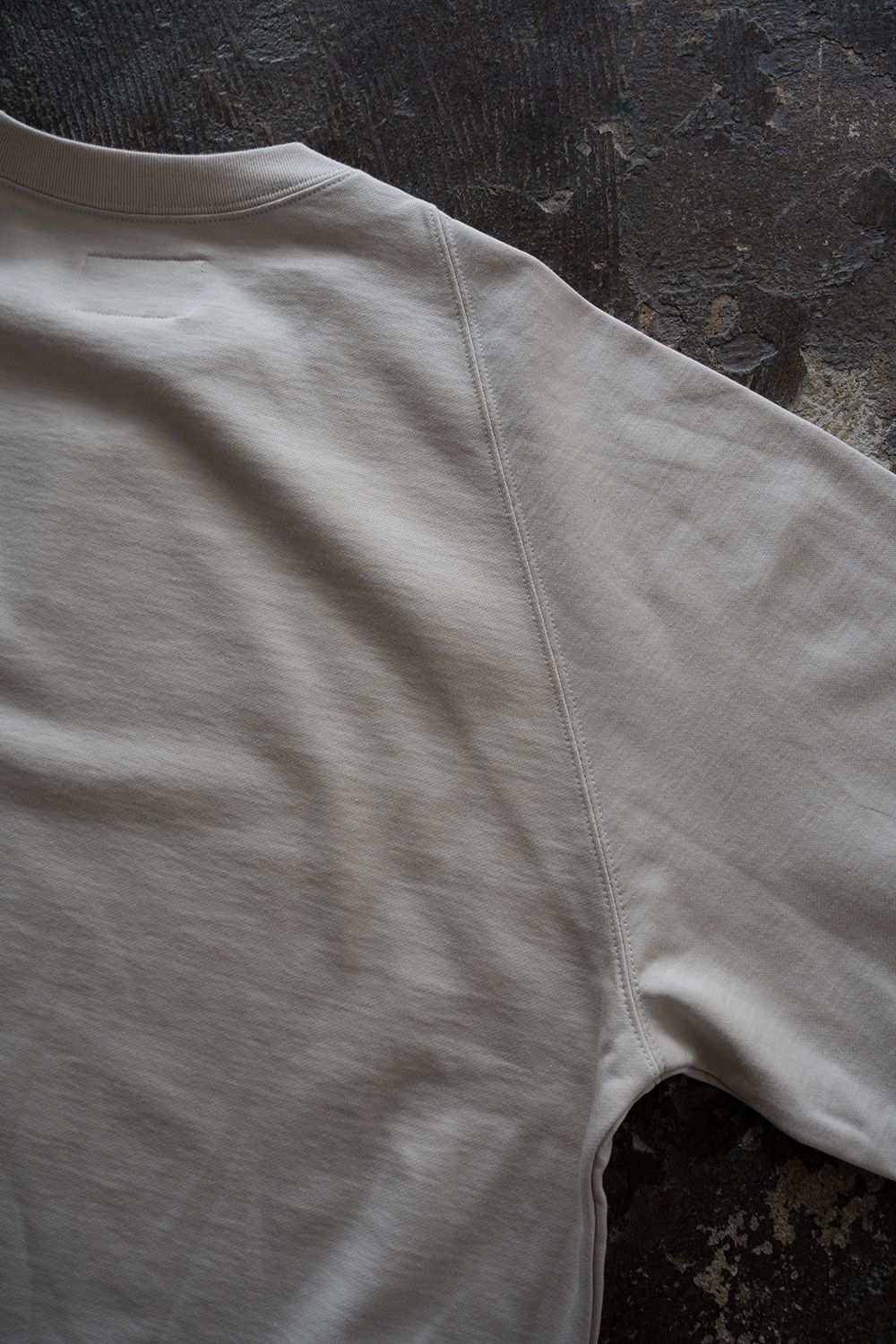【26AW】ラグランスリーブプルオーバースウェット(ECRU)