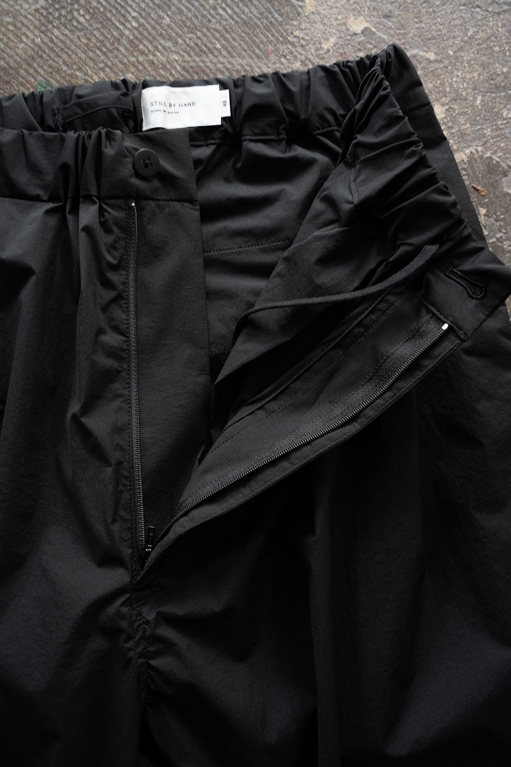 【26SS】ストレッチナイロンテーパードパンツ(BLACK)