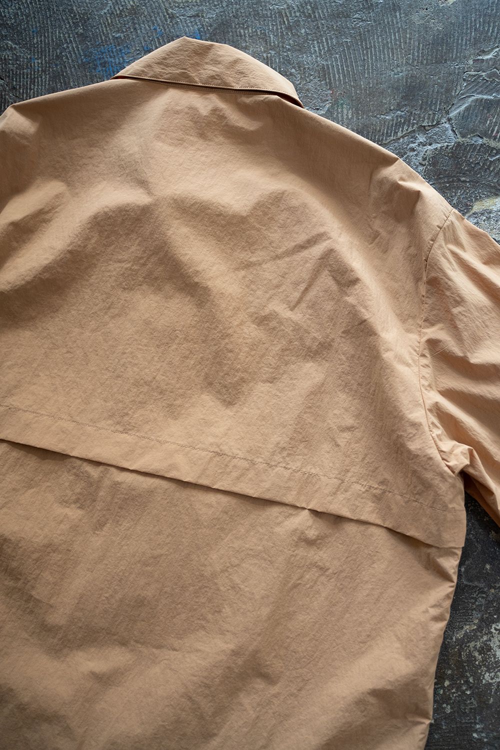 【24AW】撥水ナイロンパッカブルアノラック(PALE ORANGE)