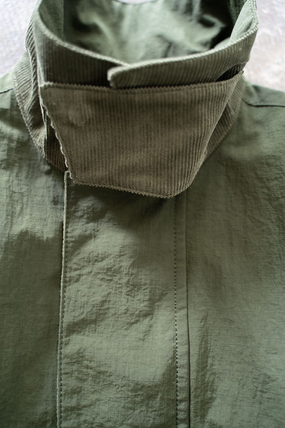 【ラスト1点】【23AW】Water Proof Rip Stop Nylon Stand Coat/撥水リップストップナイロンスタンドコート(KHAKI)【ユニセックス】
