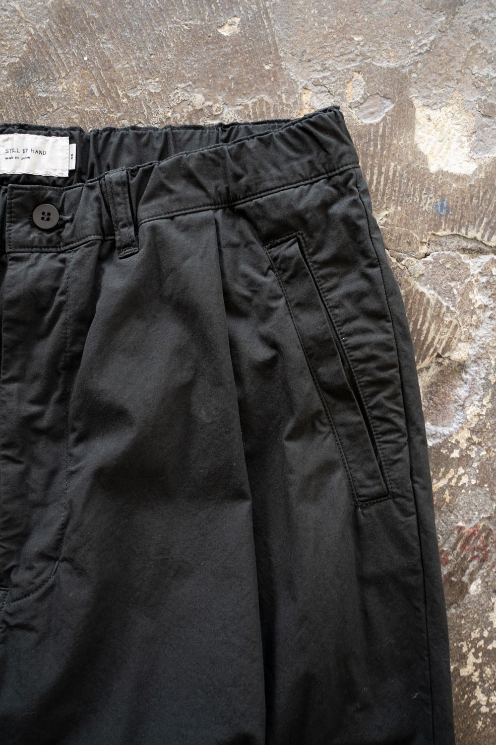 【25AW】ガーメントダイディープタックテーパードパンツ(INK BLACK)