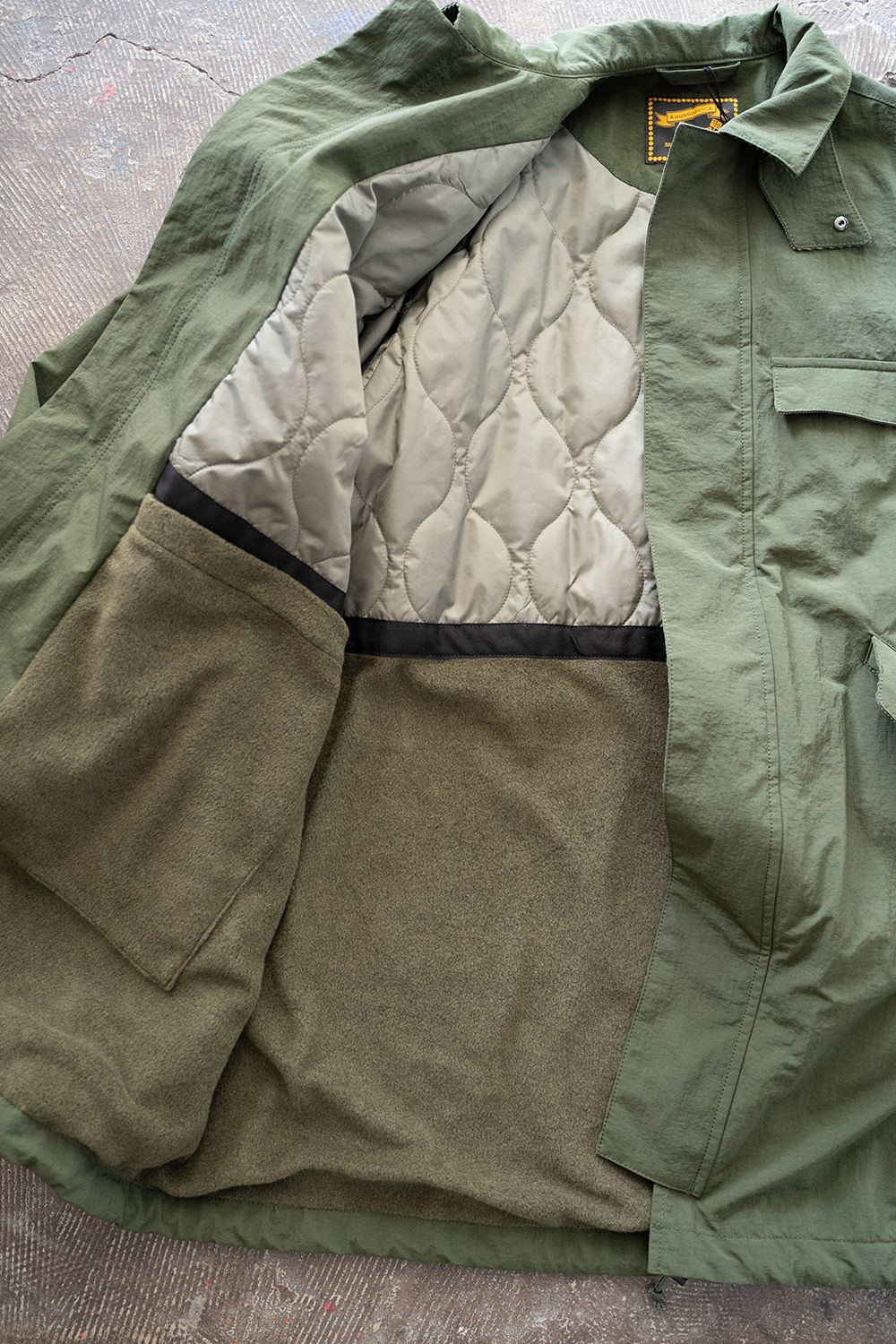 KHONOROGICA - 【ラスト1点】【23AW】Water Proof Rip Stop Nylon Stand Coat/撥水リップストップ ナイロンスタンドコート(KHAKI)【ユニセックス】 | Salty