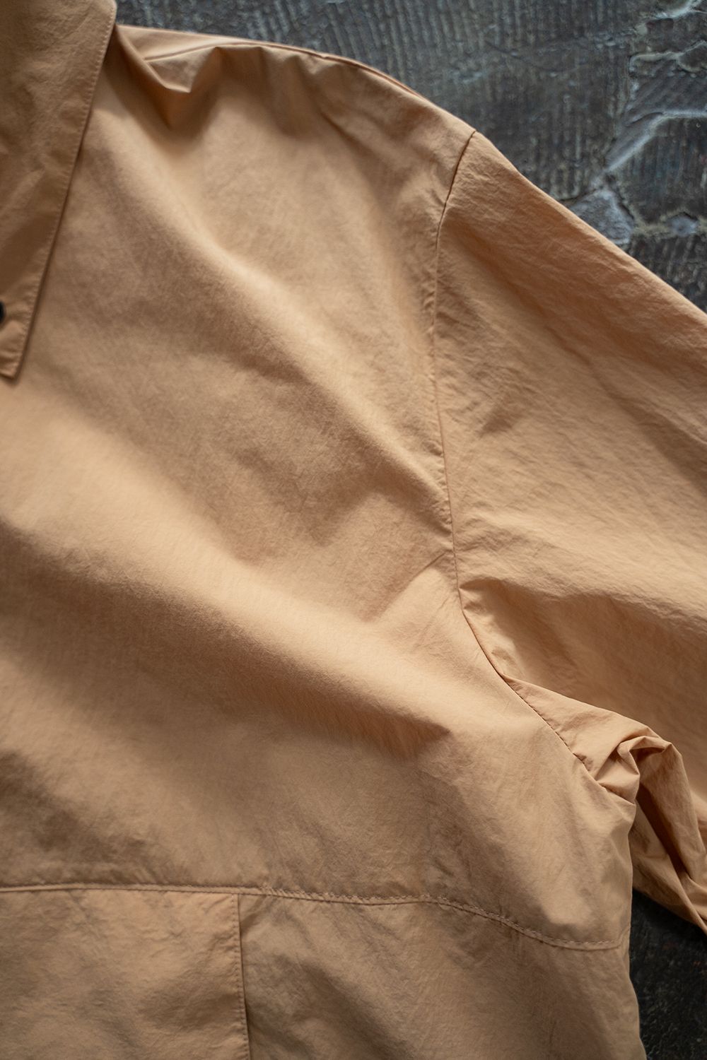 【24AW】撥水ナイロンパッカブルアノラック(PALE ORANGE)