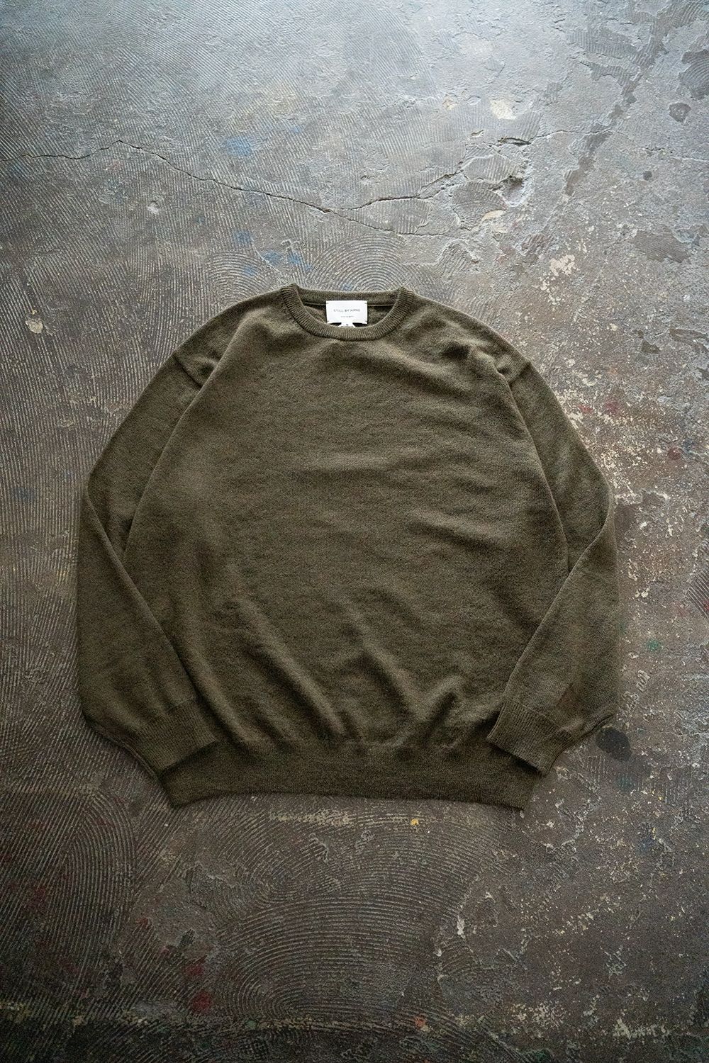 【25AW】エクストラキッドモヘア12Gニット(OLIVE)