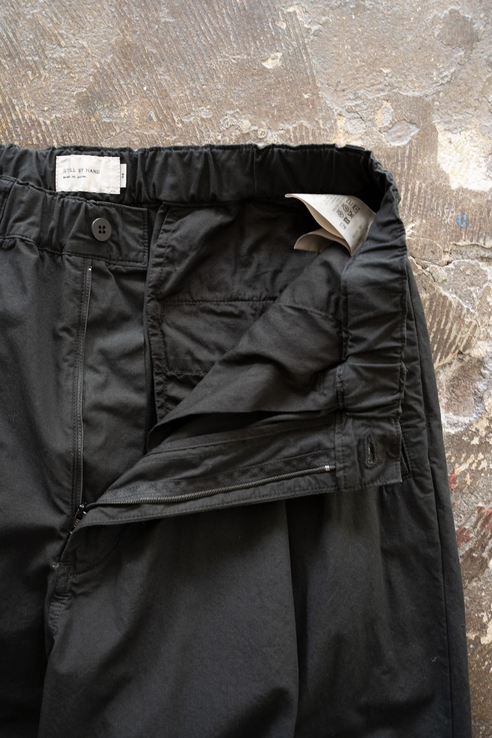 【25AW】ガーメントダイディープタックテーパードパンツ(INK BLACK)