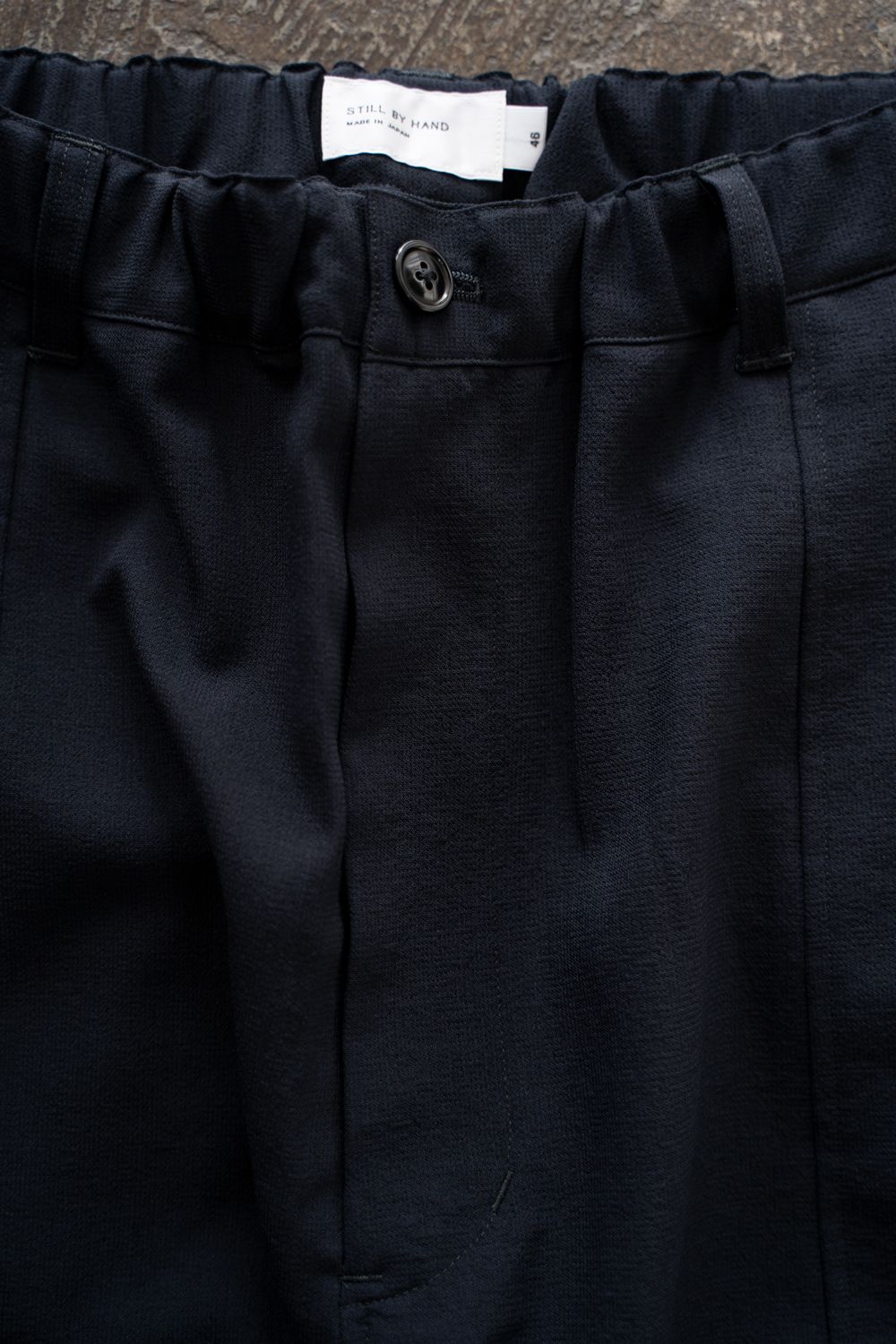 【26SS】ディープタックポリエステルワイドテーパードパンツ(DARK NAVY)