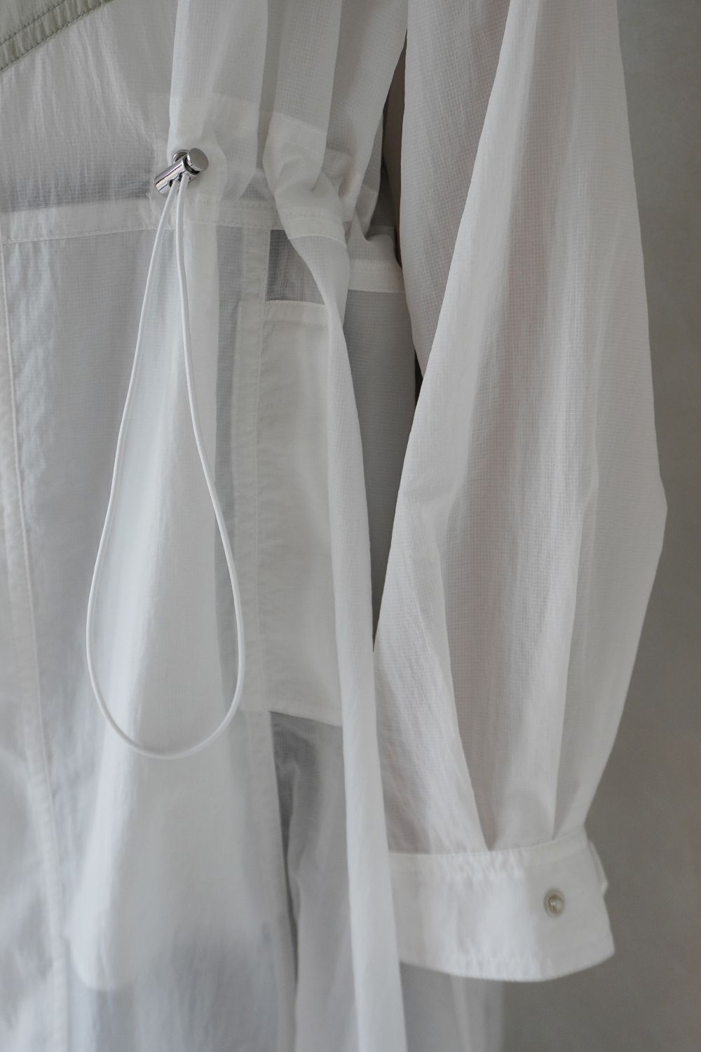 SHEER DRAWSTRING OVER COAT / シアー ドローストリング オーバーコート (ミルク)