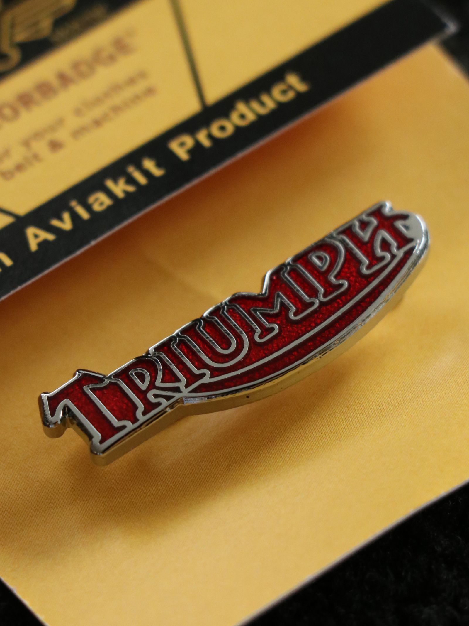 "TRIUMPH ROGO" BADGE