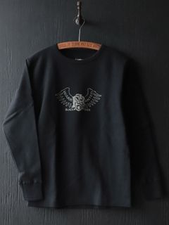 シンプルなライダーススタイルにグローブでアクセントを