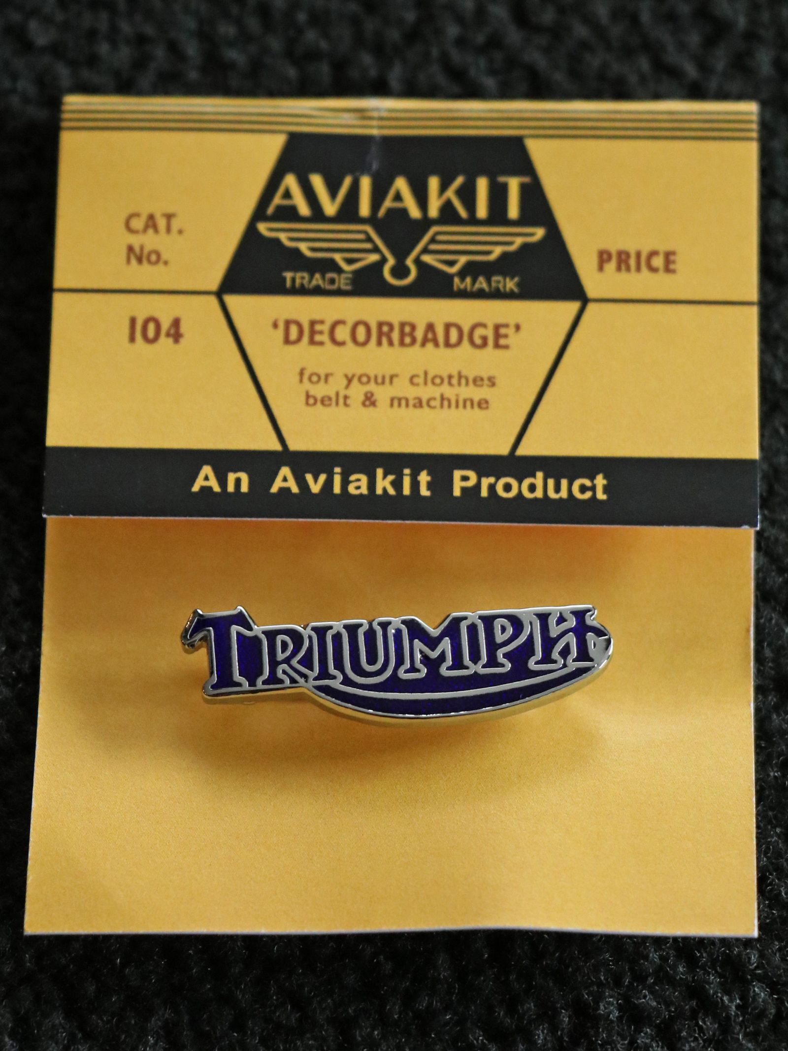 "TRIUMPH ROGO" BADGE