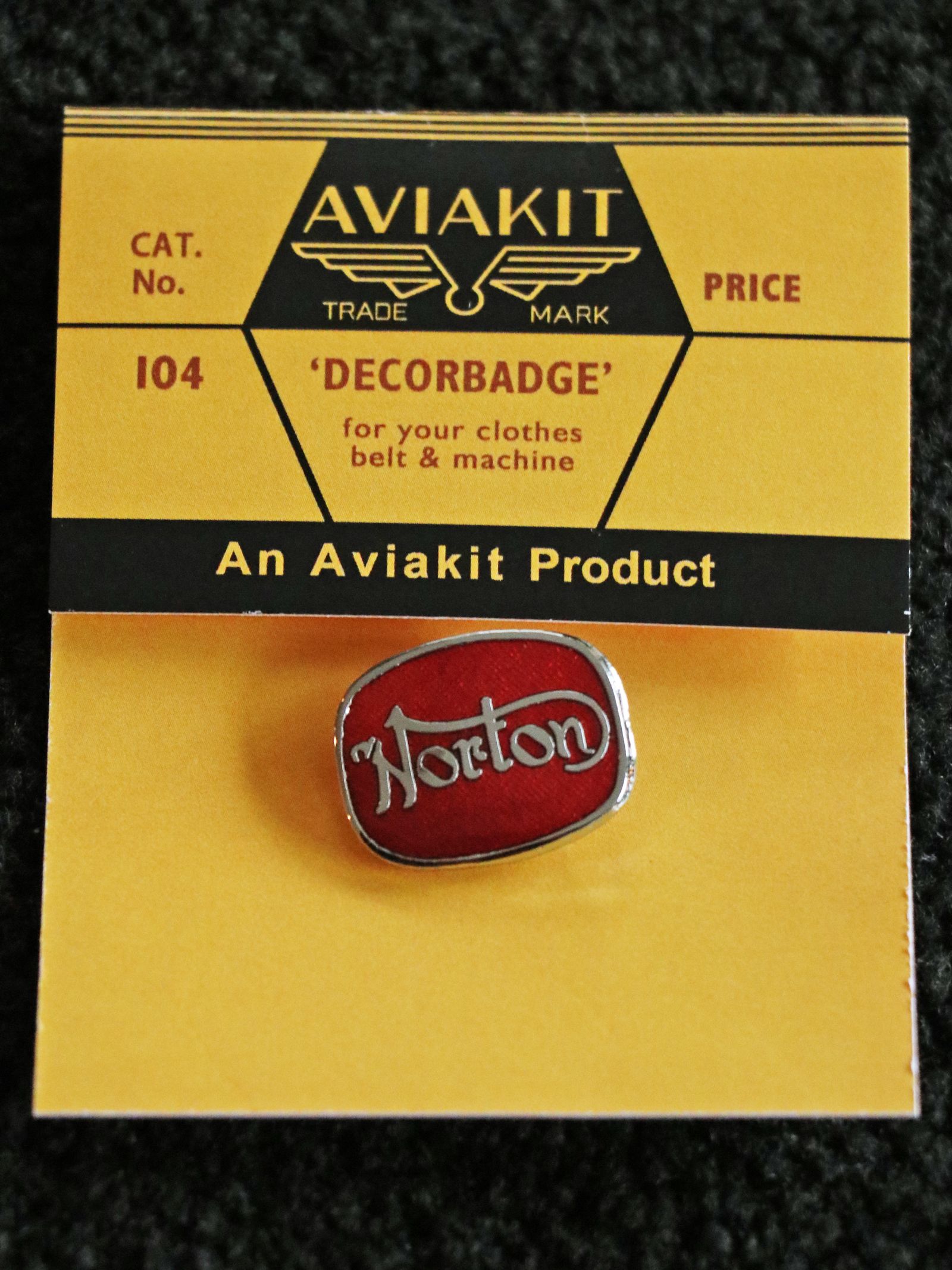 "NORTON CUSHION" BADGE