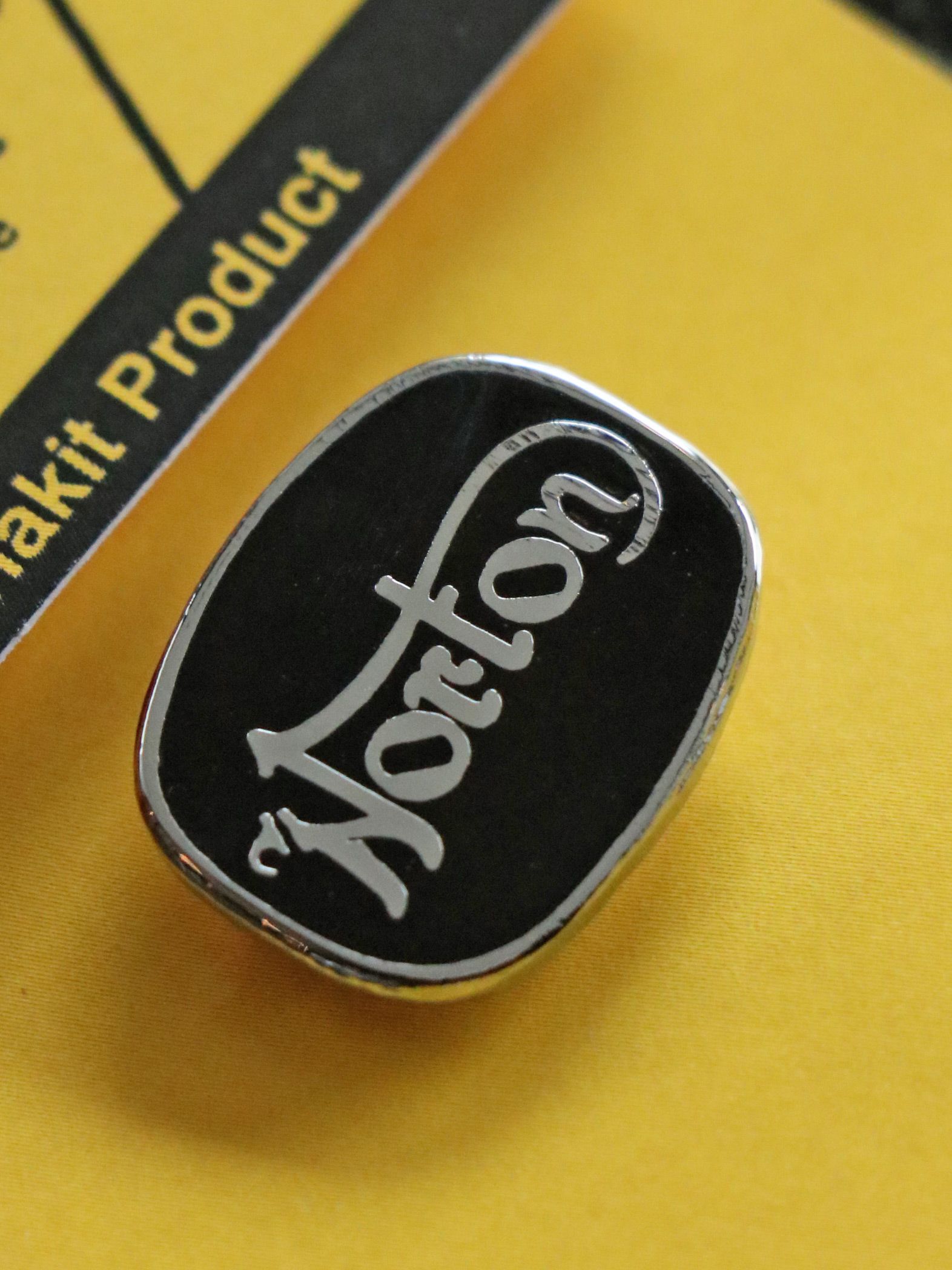 "NORTON CUSHION" BADGE