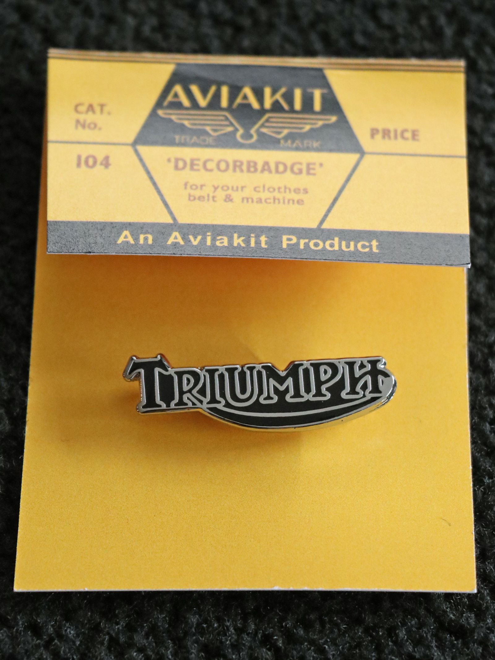 "TRIUMPH ROGO" BADGE