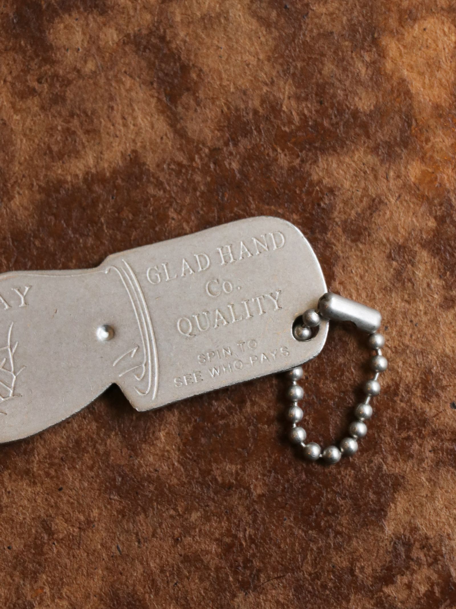 GLAD HAND & Co. - You Pay Spinner (Brass) | SKANDA GLAD HAND & Co. - You Pay Spinner (Brass) | SKANDA