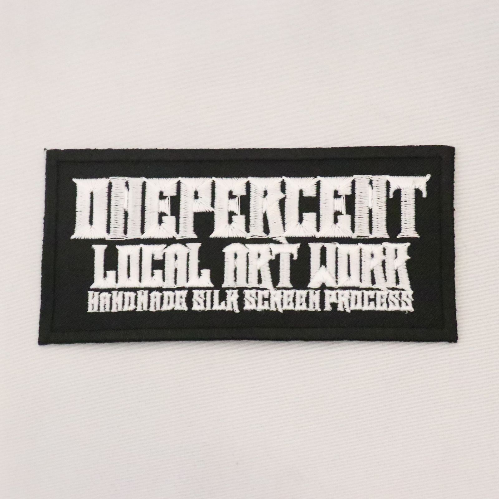 "ONEPERCENT LOCAL ART WORK" WAPPEN (WHITE)