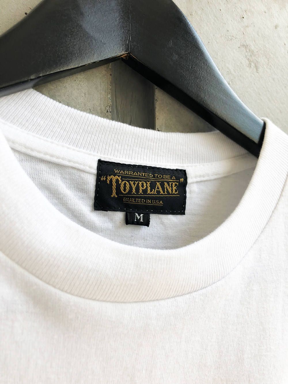 オールオーバーアウトラストTシャツ(ホワイト) / ALL OVER OUTLAST TEE (WHITE)