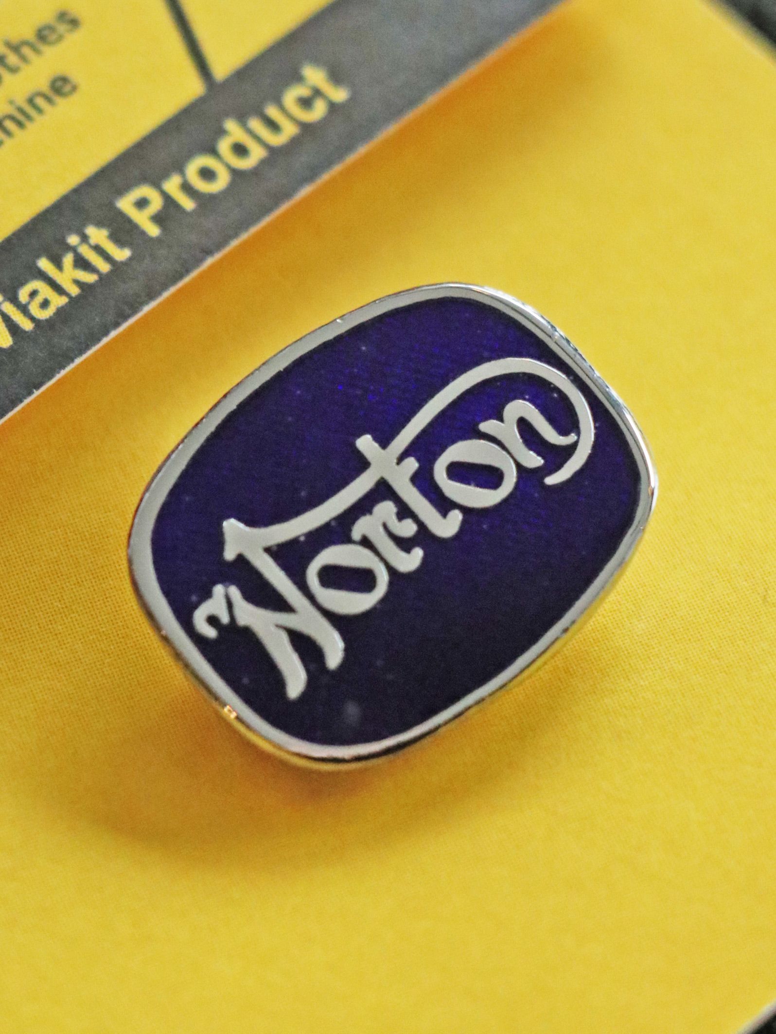 "NORTON CUSHION" BADGE