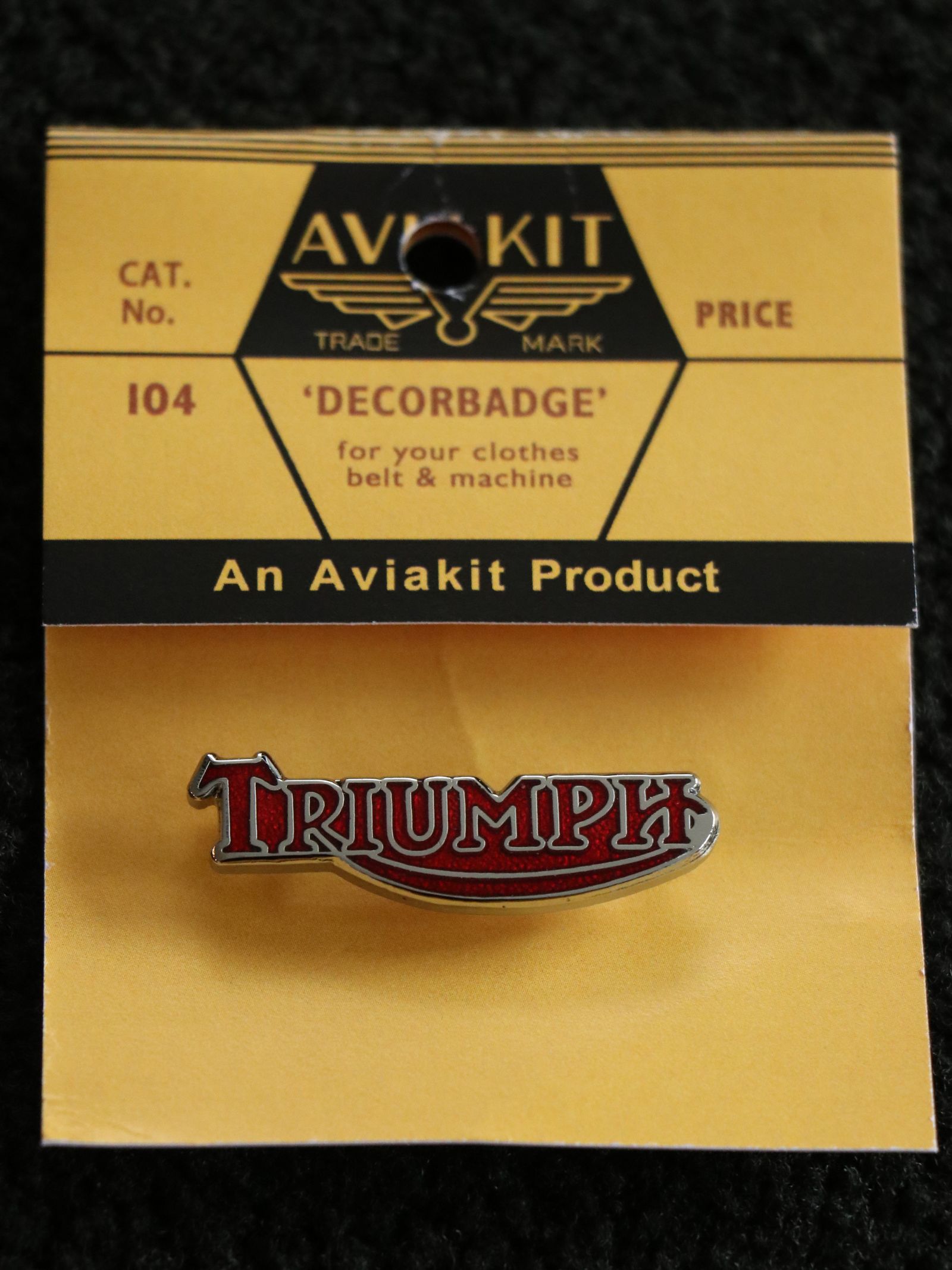 "TRIUMPH ROGO" BADGE