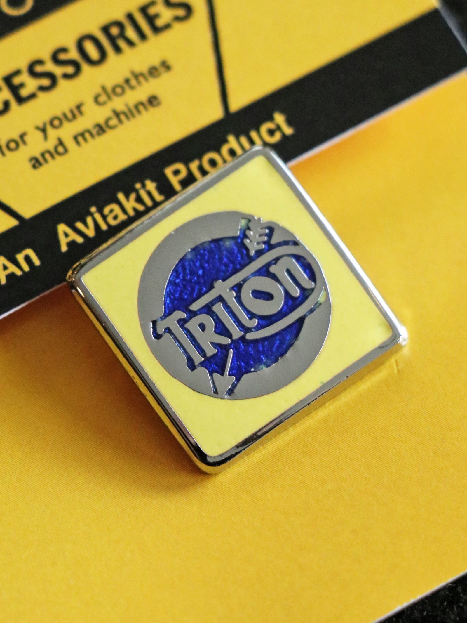 "TRITON SQUARE" BADGE