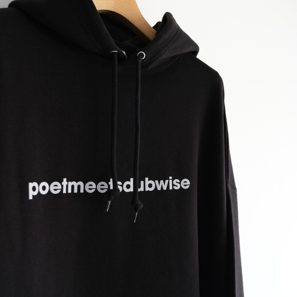 『"poetmeetsdubwise"LOOSE FIT HOODIE』